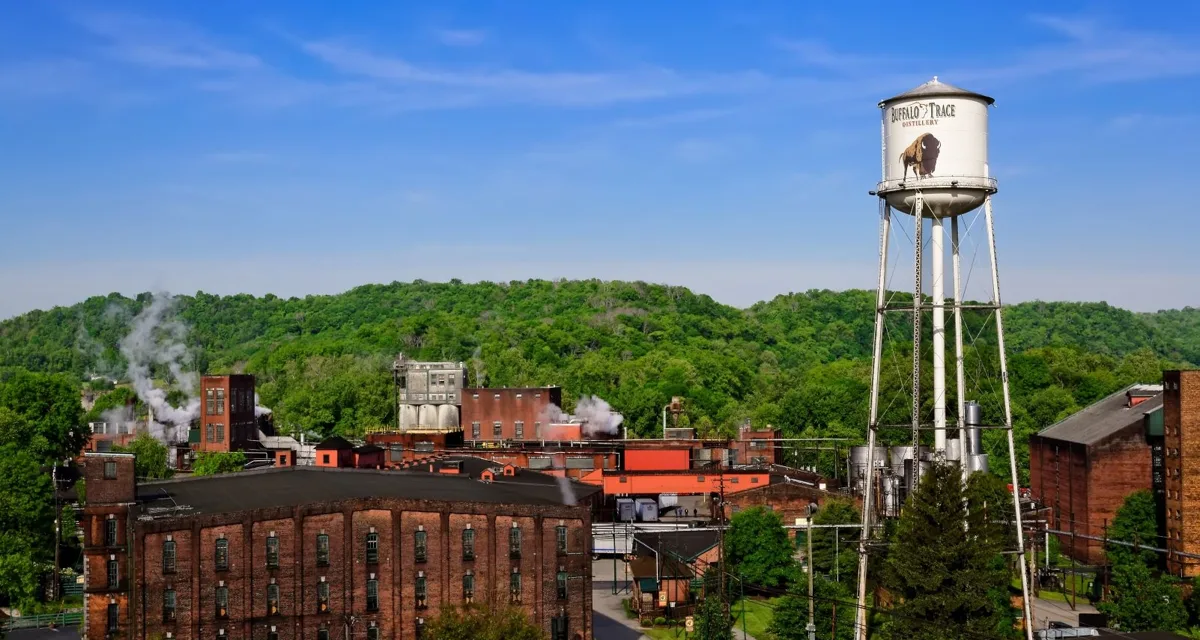 best time to visit Buffalo Trace Distillery: the Frankfort campus and water tower in golden light