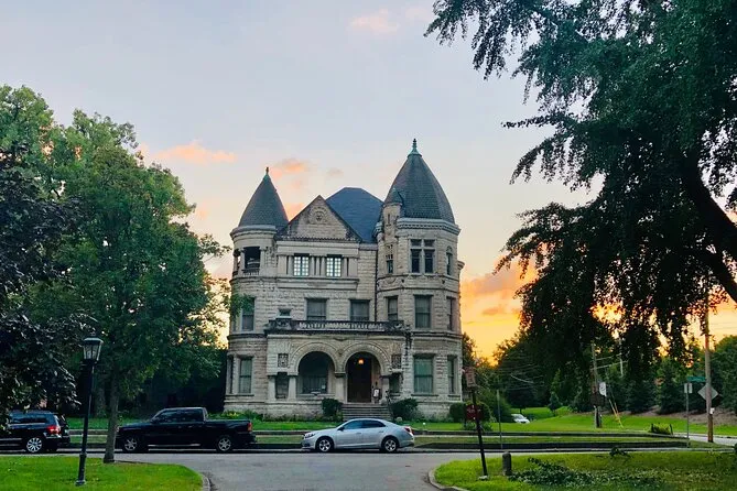 Victorian mansion at dusk on the Old Louisville ghost walk booked alongside a Buffalo Trace distillery tour