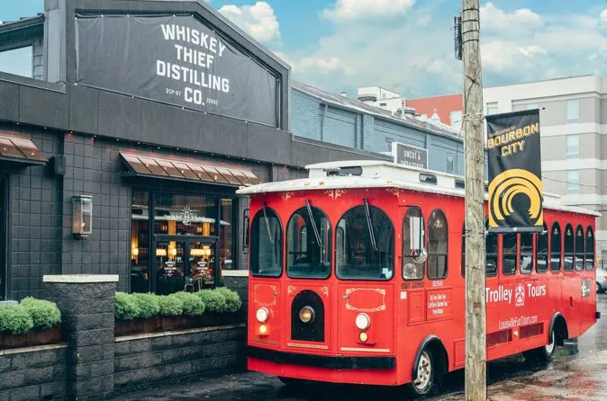Vintage trolley outside a Louisville distillery on a tasting tour paired with a Buffalo Trace distillery tour